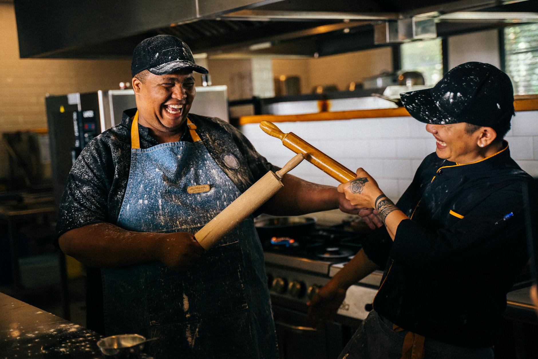 kitchen workers having fun moments in the kitchen